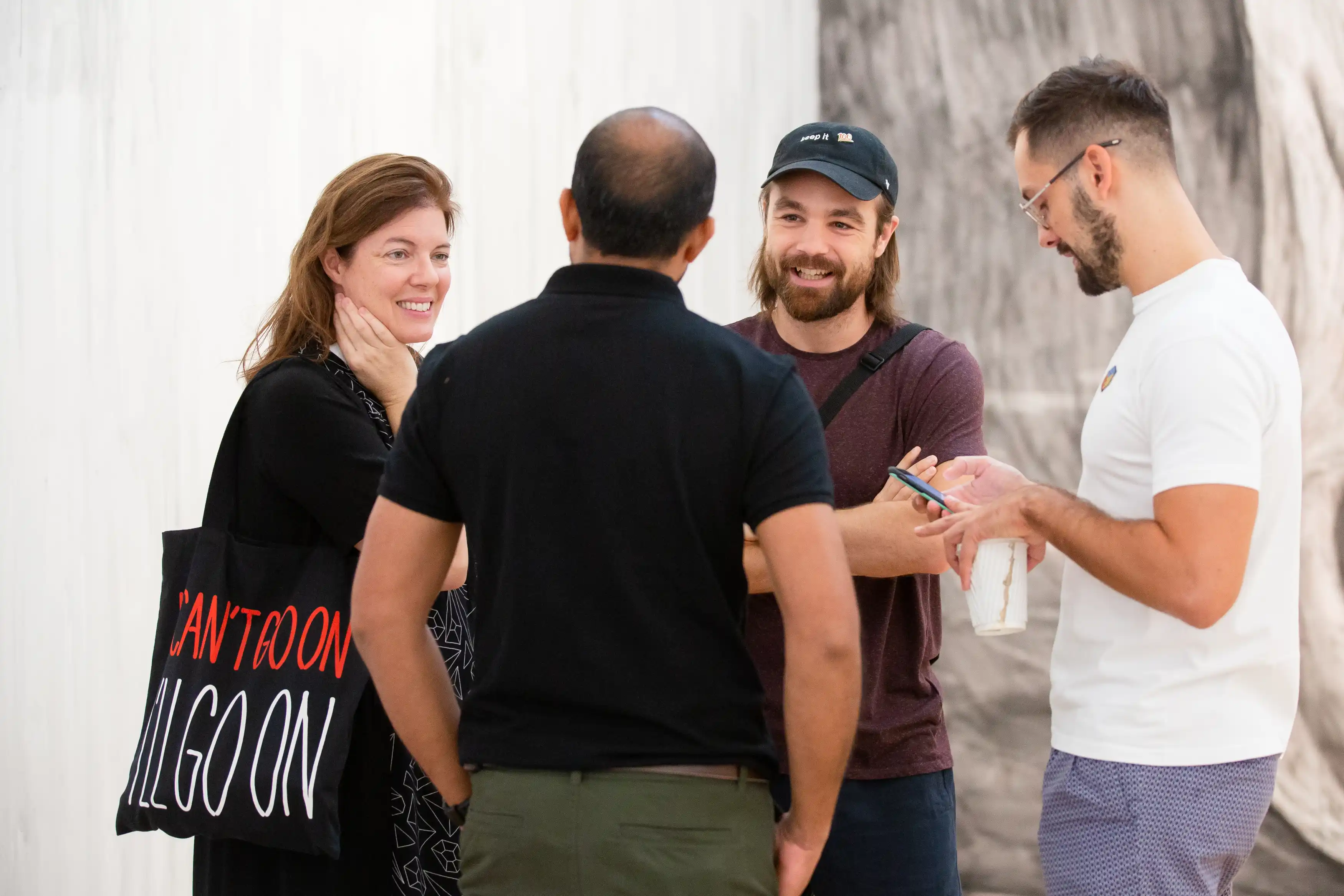 A group of individuals in conversation with each other.